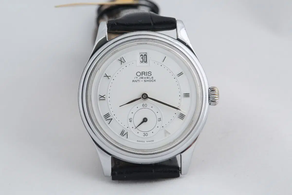 오리스 ORIS 스몰세컨즈 화이트 다이얼 수동시계 7404A